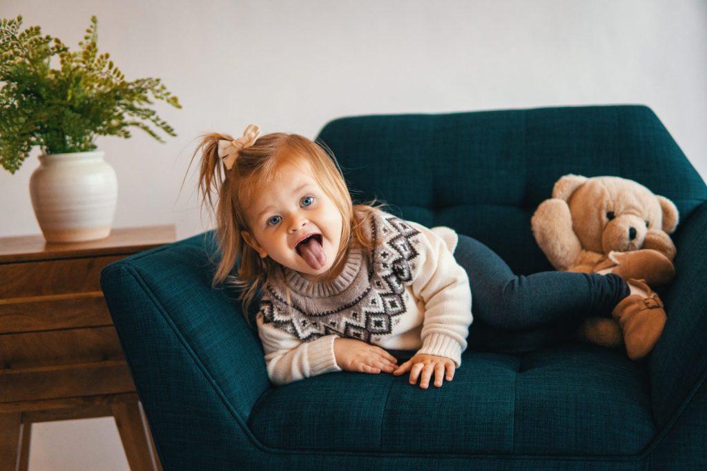 detailed reasons why babies stick their tongues out